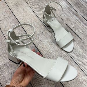 Stuart Weitzman Peewee White Patent Leather Sandals